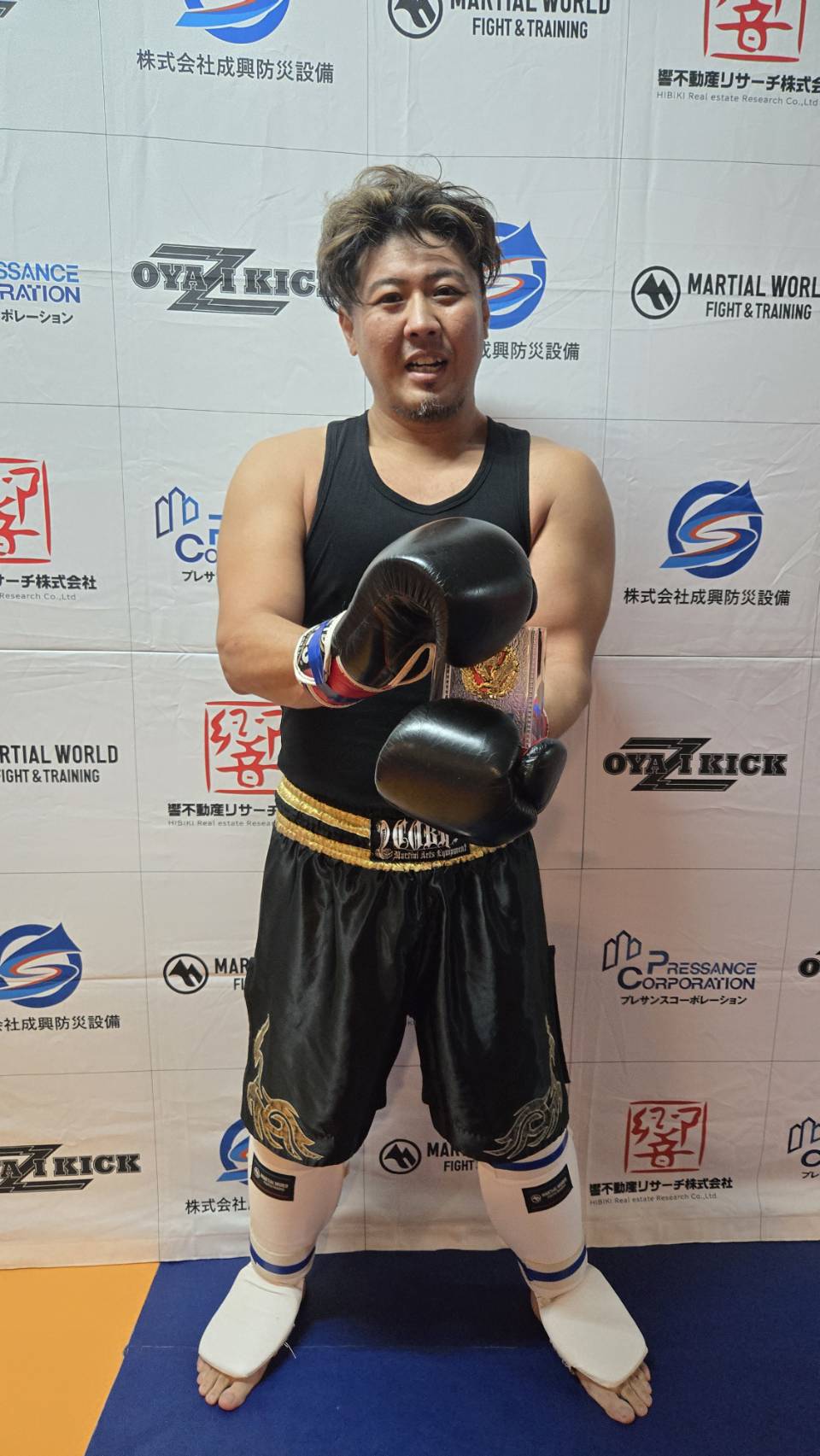 柁津 綾介